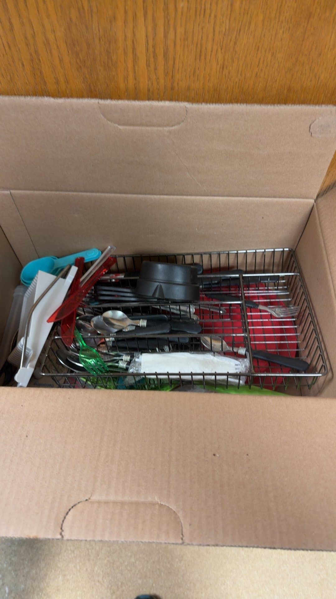 Assorted Kitchenware and Cutlery Lot with Wire Basket - Image 1