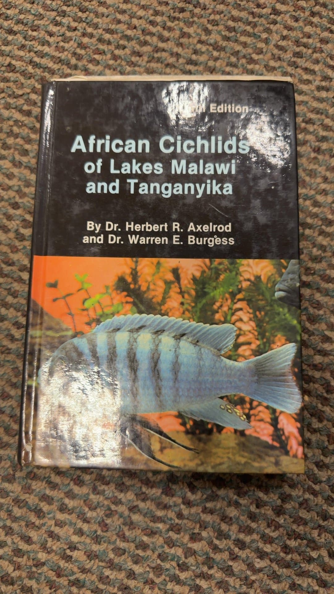African Cichlids of Lakes Malawi and Tanganyika Hardcover Book (Ninth Edition) - Image 1