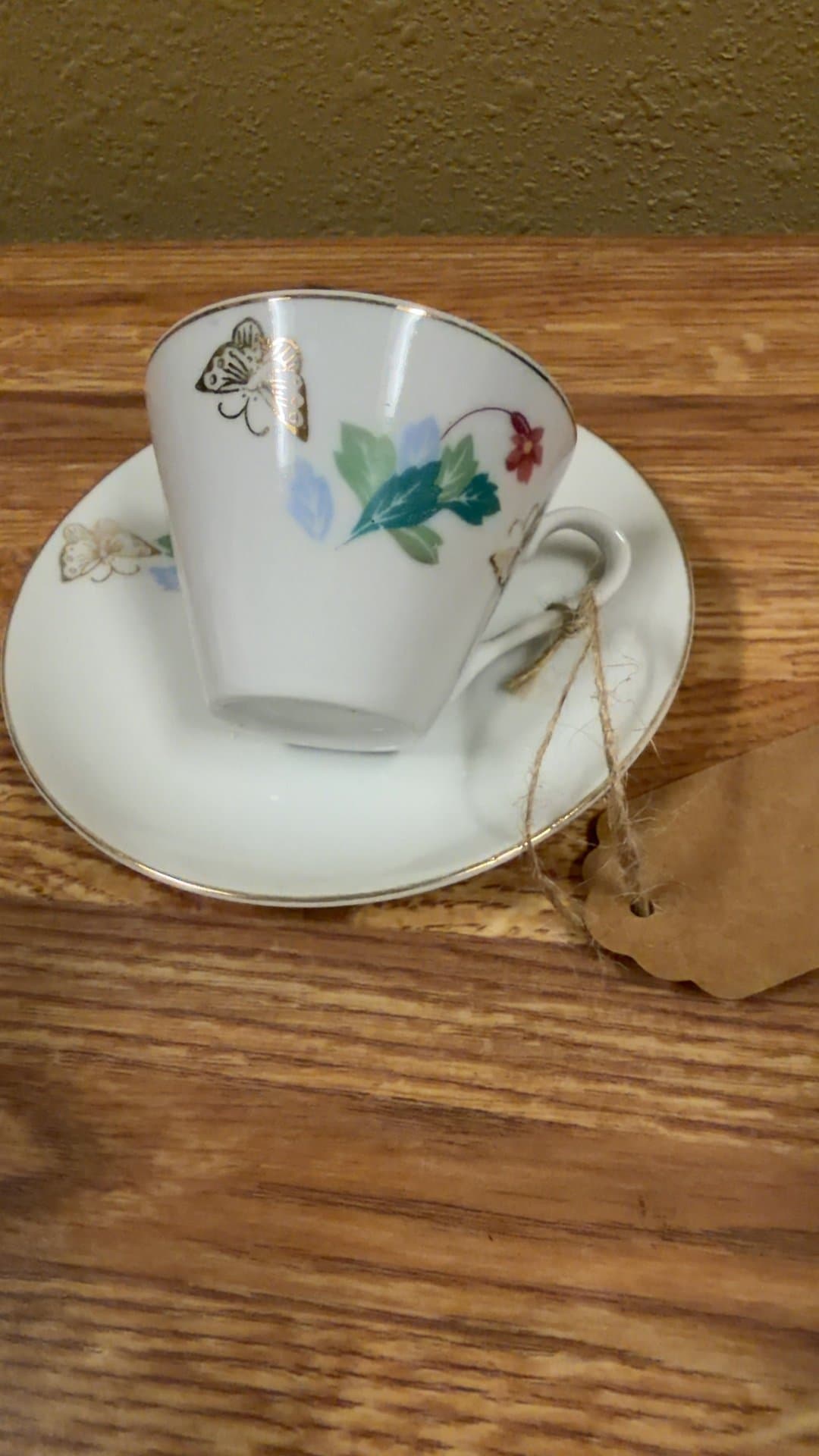 Miniature Japanese Porcelain Cup and Saucer Set - Image 1