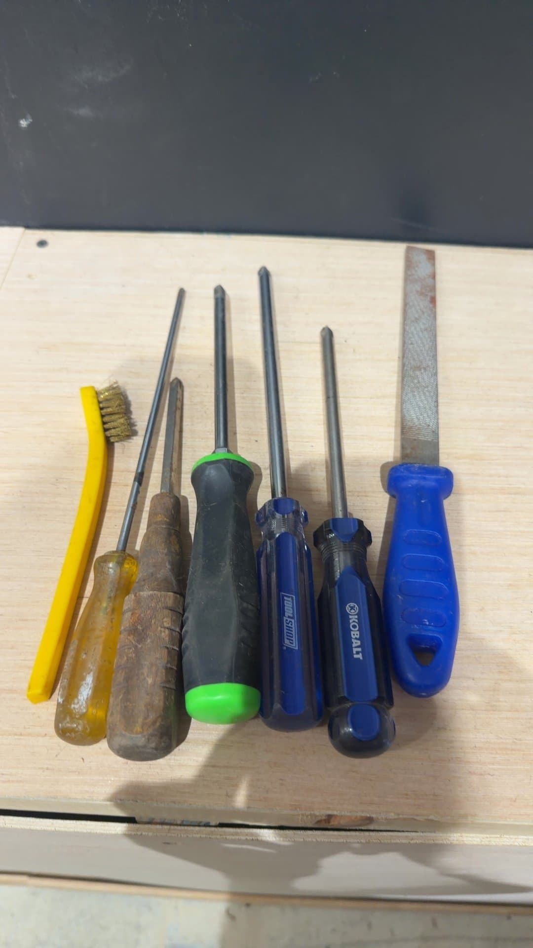 Assorted Hand Tools Set including Screwdrivers, Metal File, and Wire Brush - Image 1