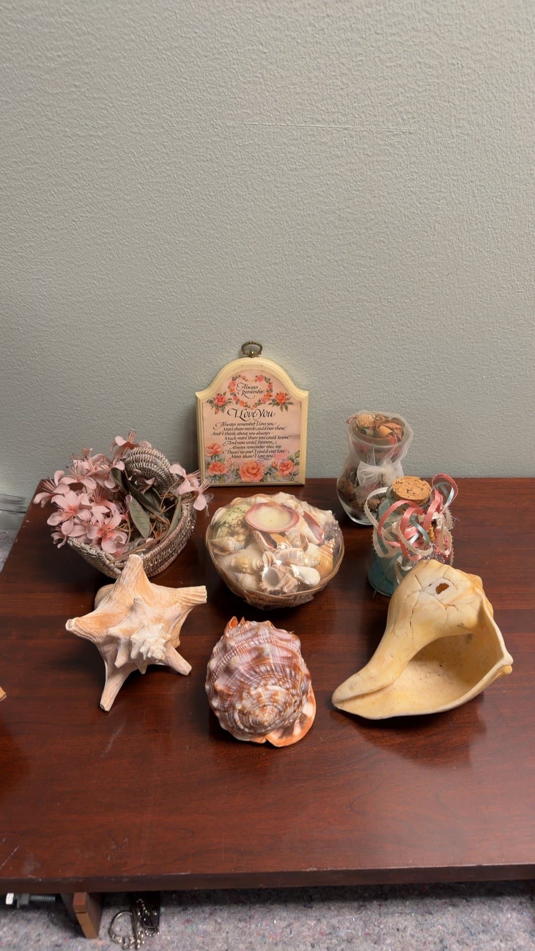 Decorative Seashell and Floral Arrangement - Image 1