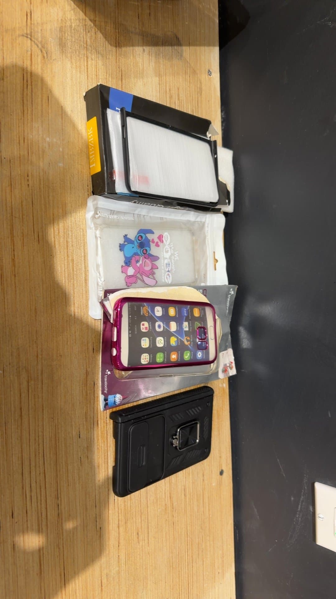 Assorted Cell Phone Cases and Accessories Lot - Image 1