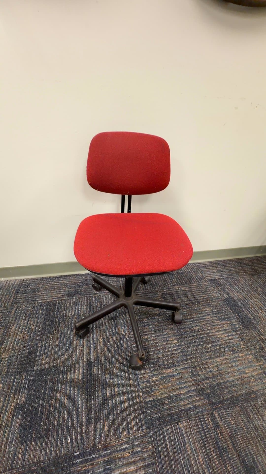 Red Fabric Armless Office Task Chair - Image 1