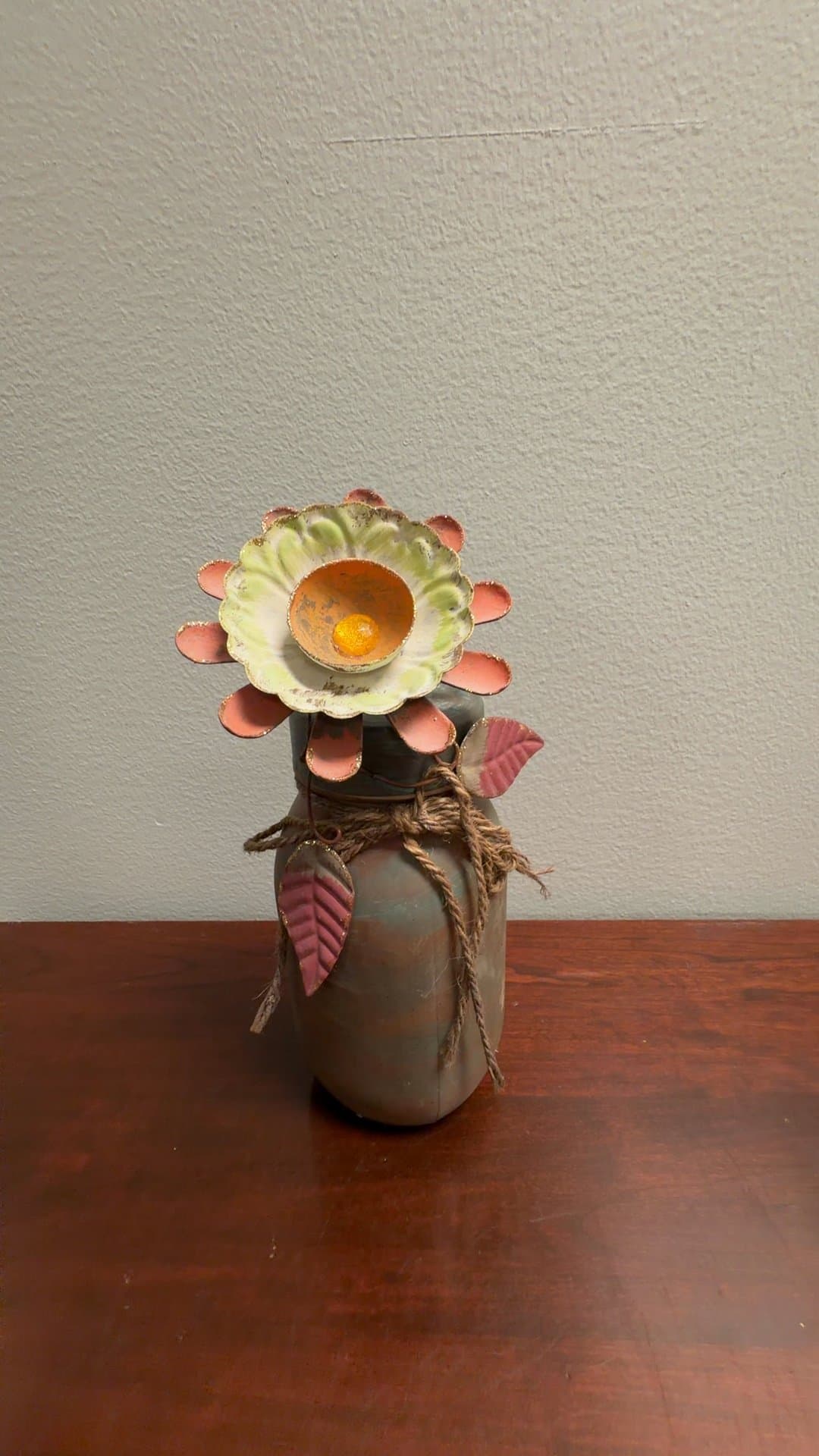 Rustic Metal Flower in Earthenware Vase - Image 1