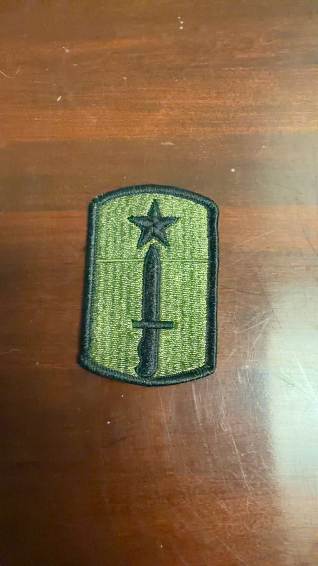Military Patch with Star and Sword Design - Image 1