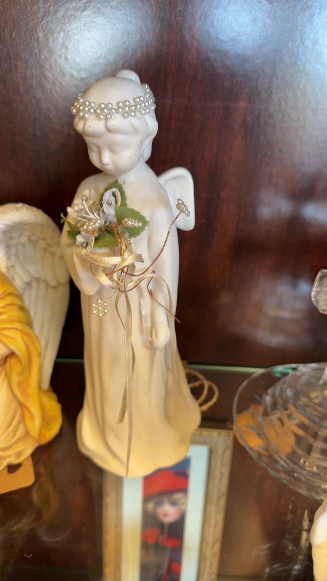 Porcelain Angel Figurine with Floral Accents - Image 1