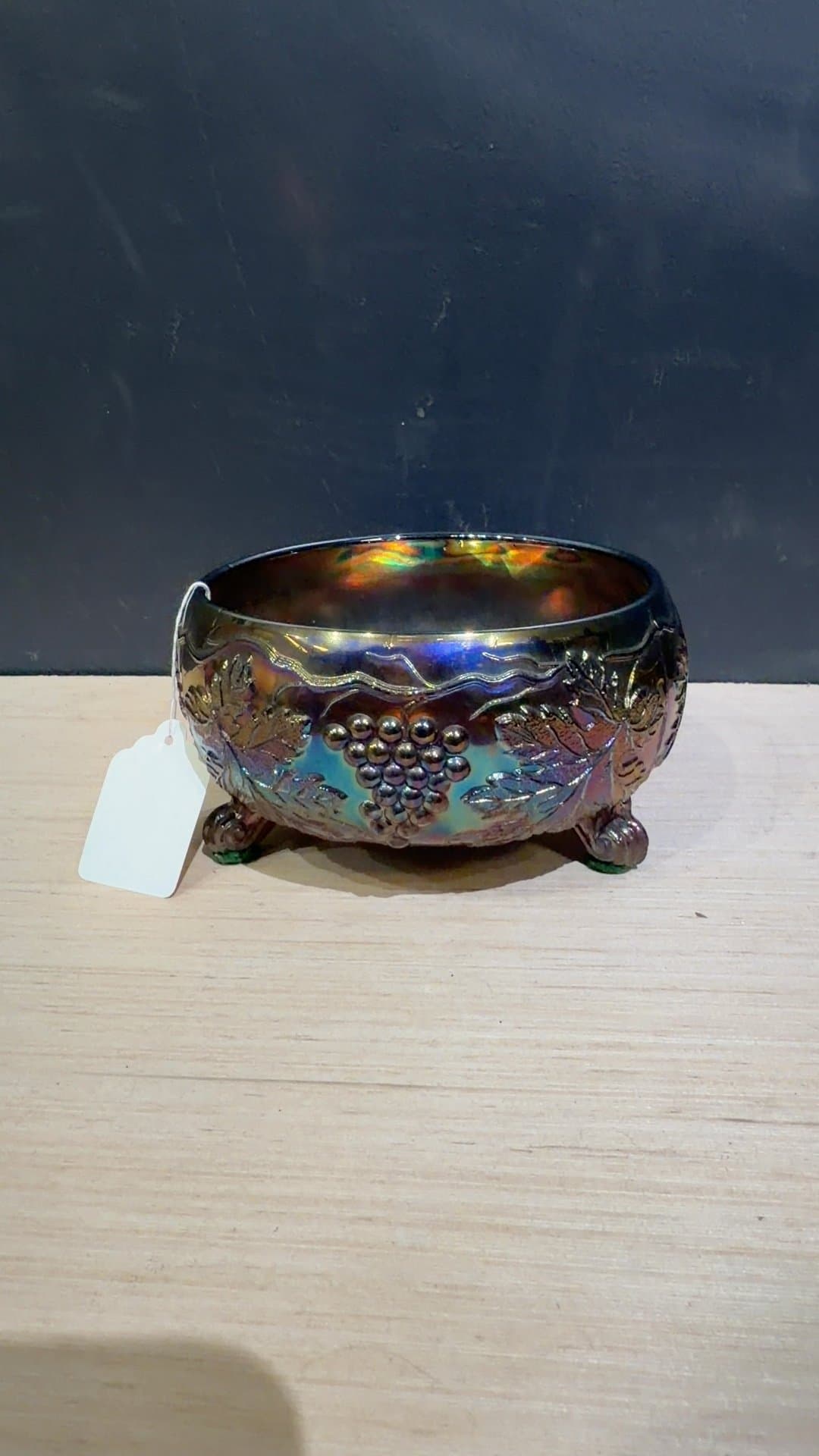 Vintage Amethyst Carnival Glass Grape and Cable Three-Footed Bowl - Image 1