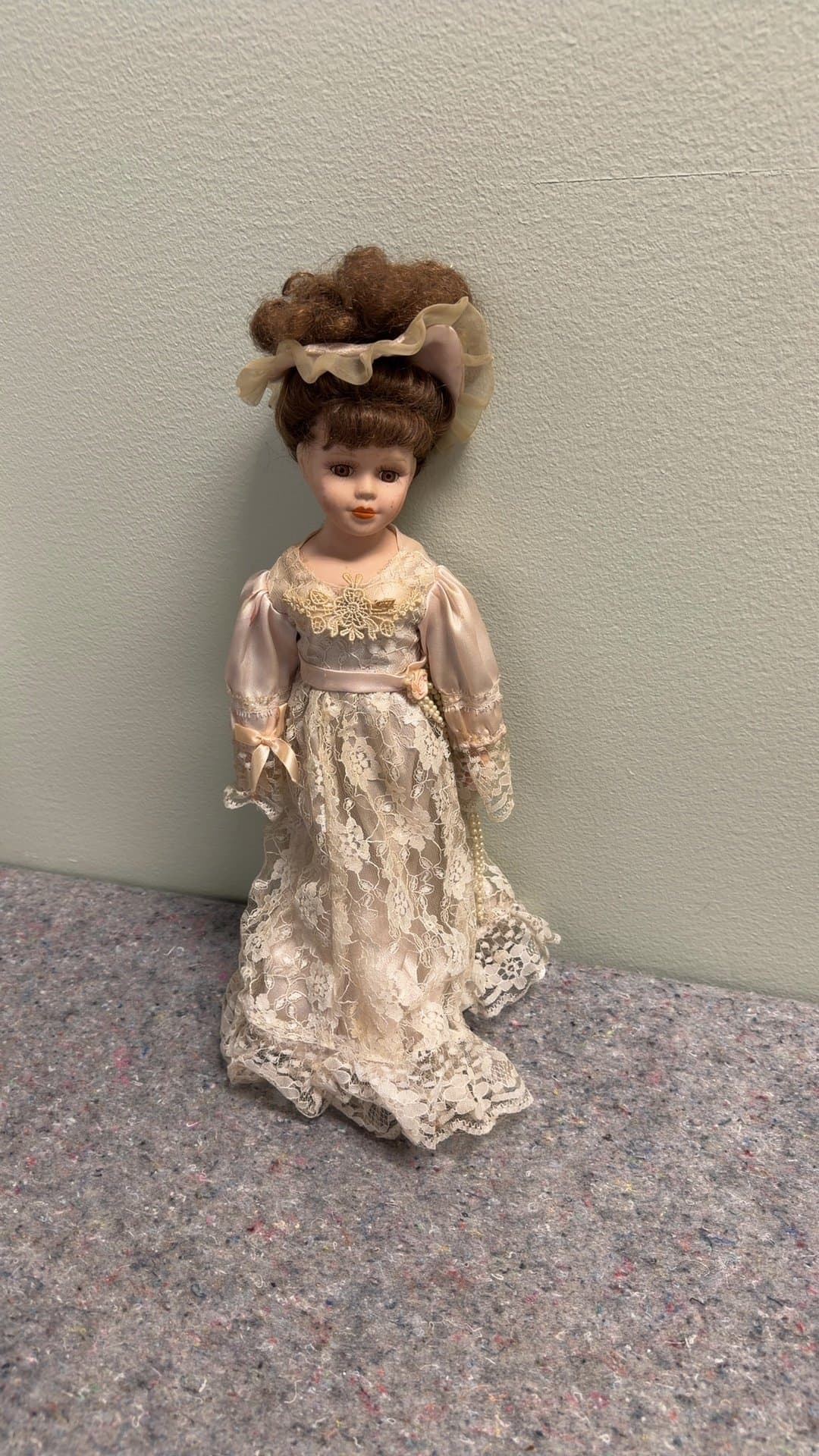 Vintage Porcelain Doll in Lace Dress - Image 1