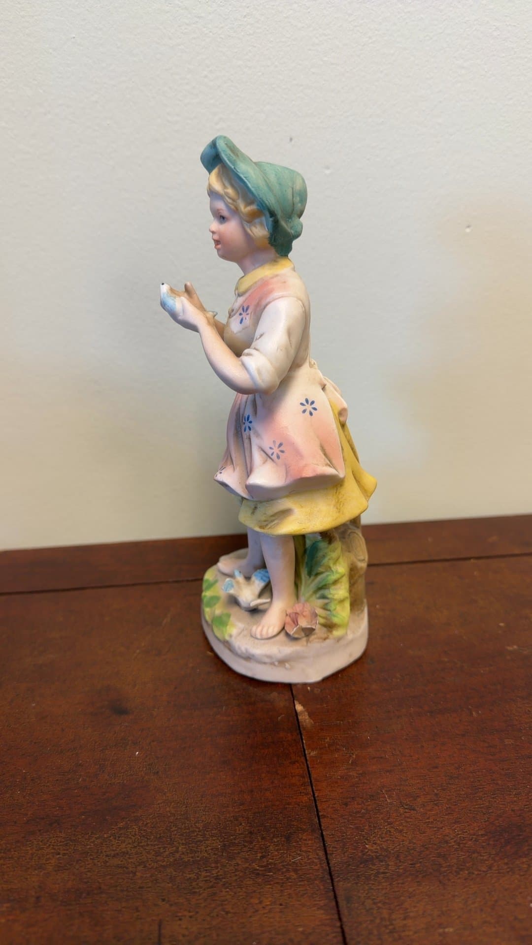 Porcelain Figurine of Girl with Bird - Image 1