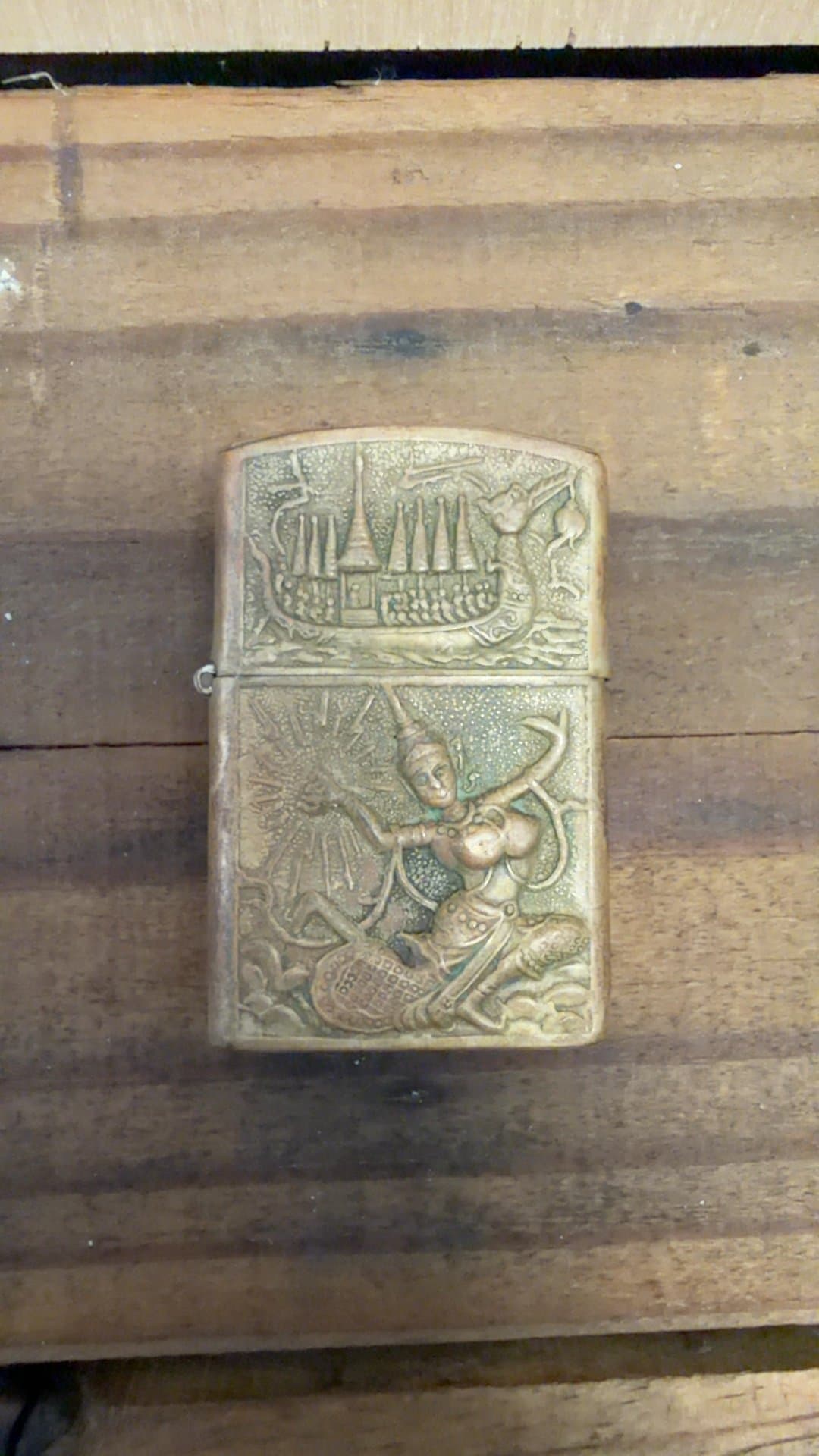 Vintage Thai Brass Lighter with Carved Figures - Image 1