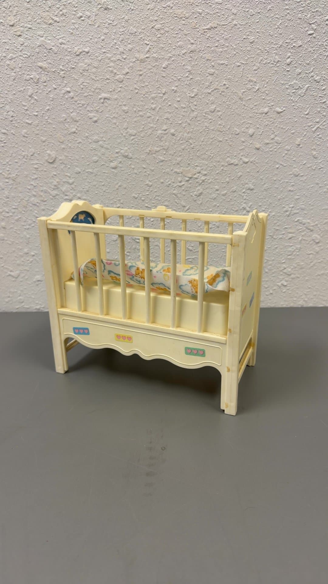 Vintage Plastic Doll Crib Toy with Mattress and Blanket - Image 1