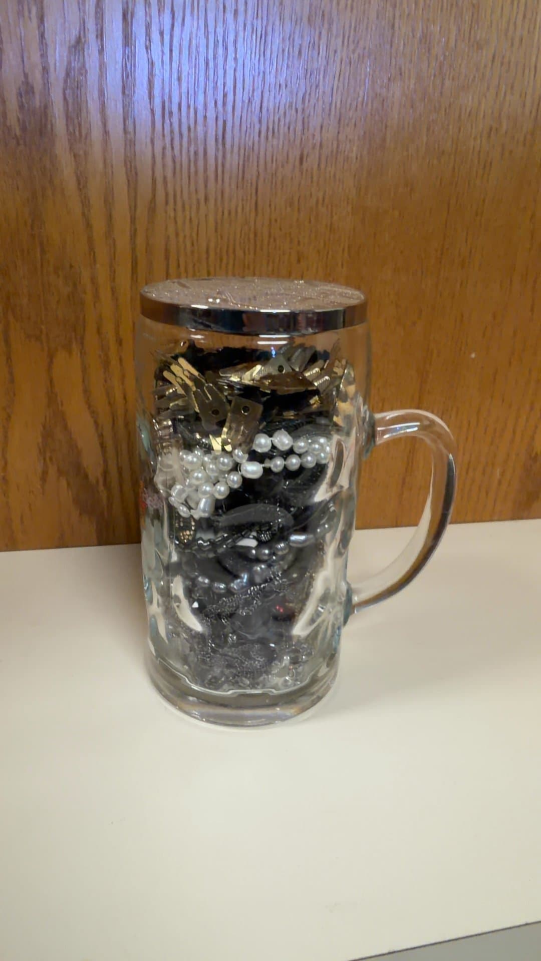 Glass Beer Stein with Assorted Jewelry - Image 1