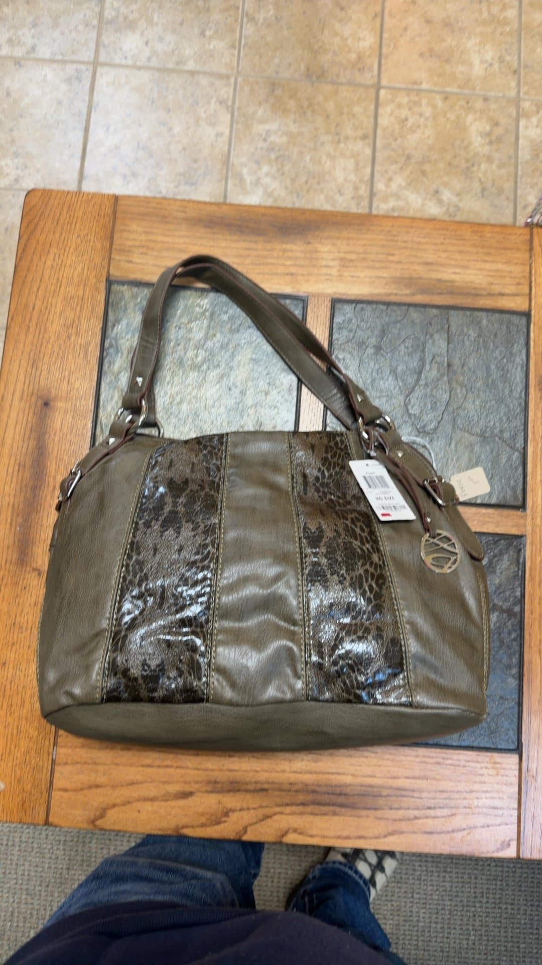 Earth Green Handbag with Animal Print Accents - Image 1