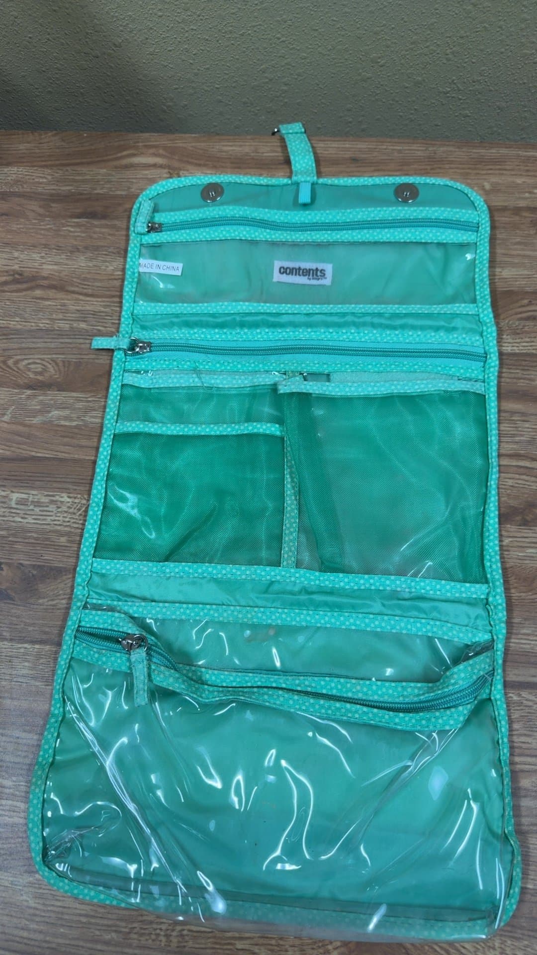 Turquoise Hanging Travel Bag with Multiple Pockets - Image 1