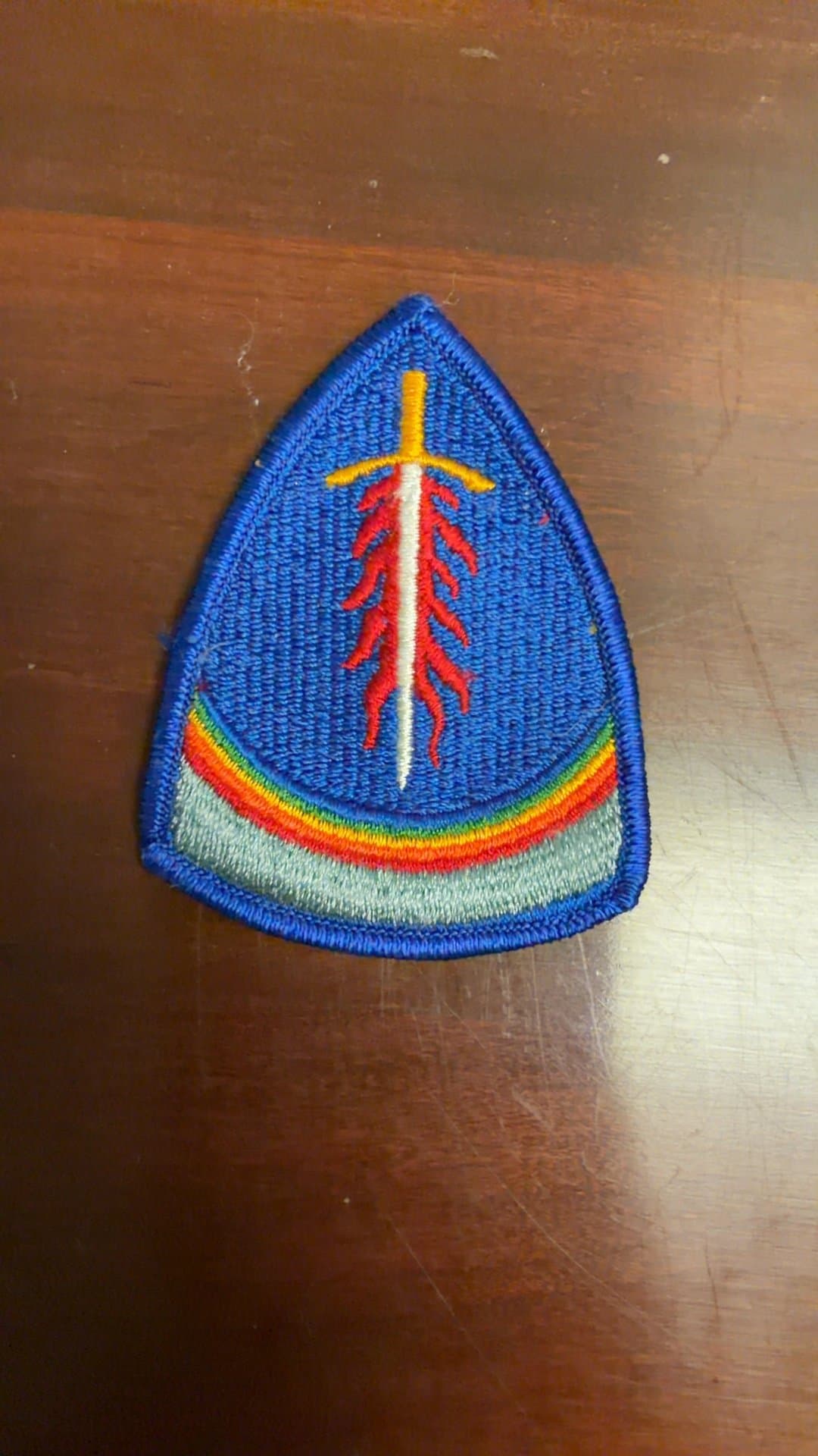 Military Patch with Sword and Rainbow Design - Image 1