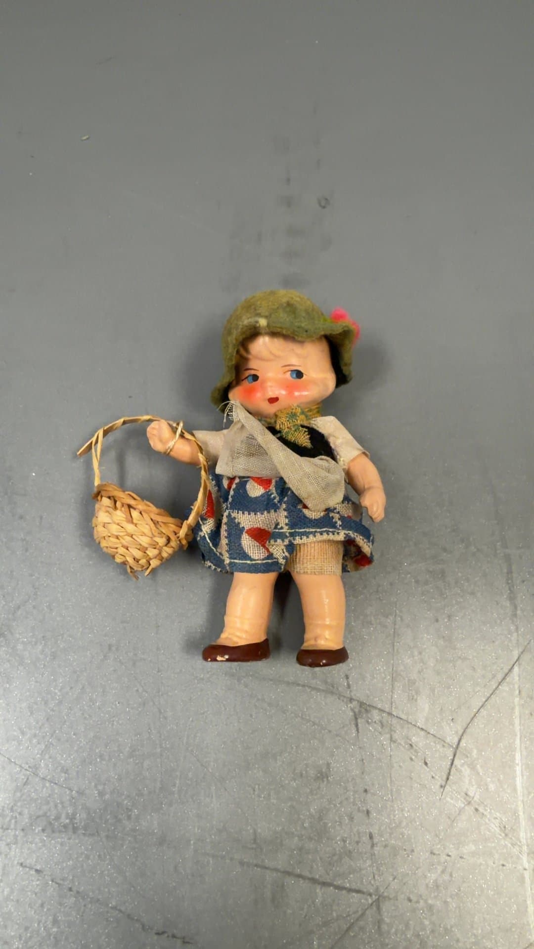 Vintage German Celluloid or Hard Plastic Souvenir Doll in Trachten Costume with Basket - Image 1