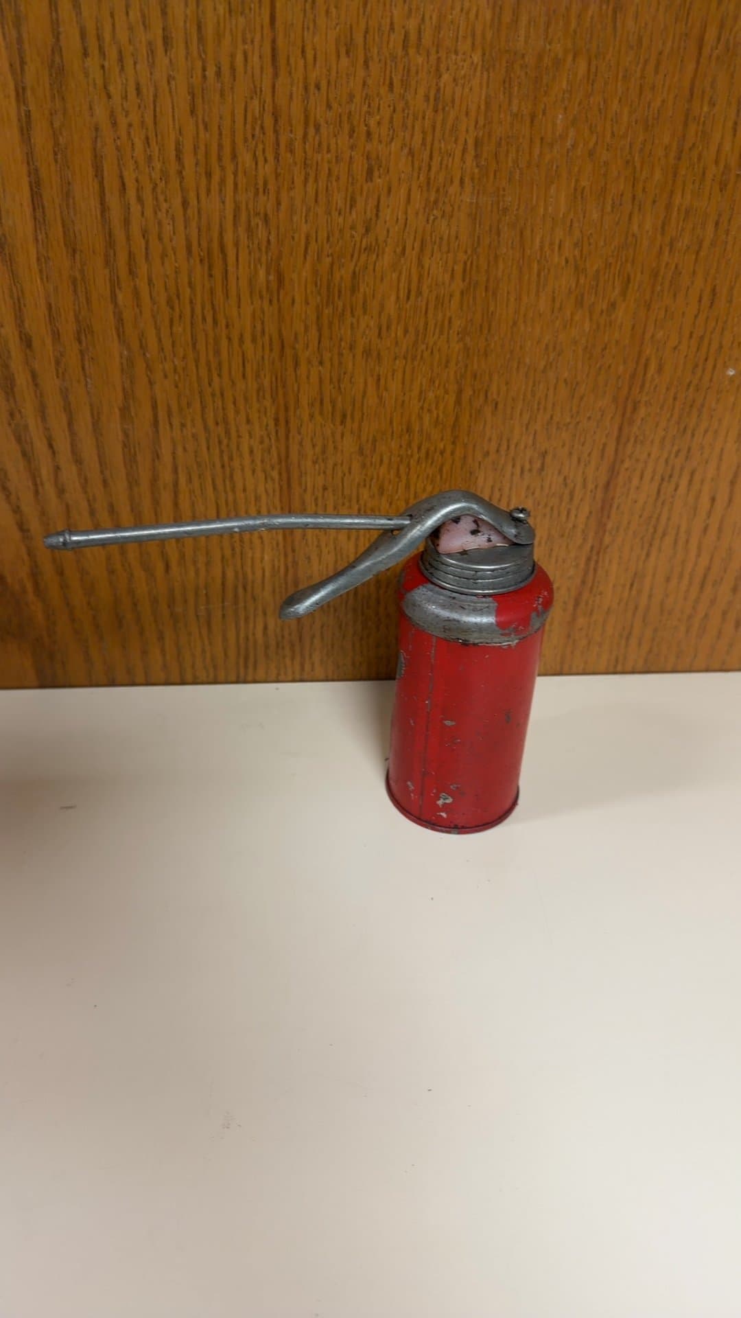 Vintage Red Metal Thumb Pump Oil Can - Image 1