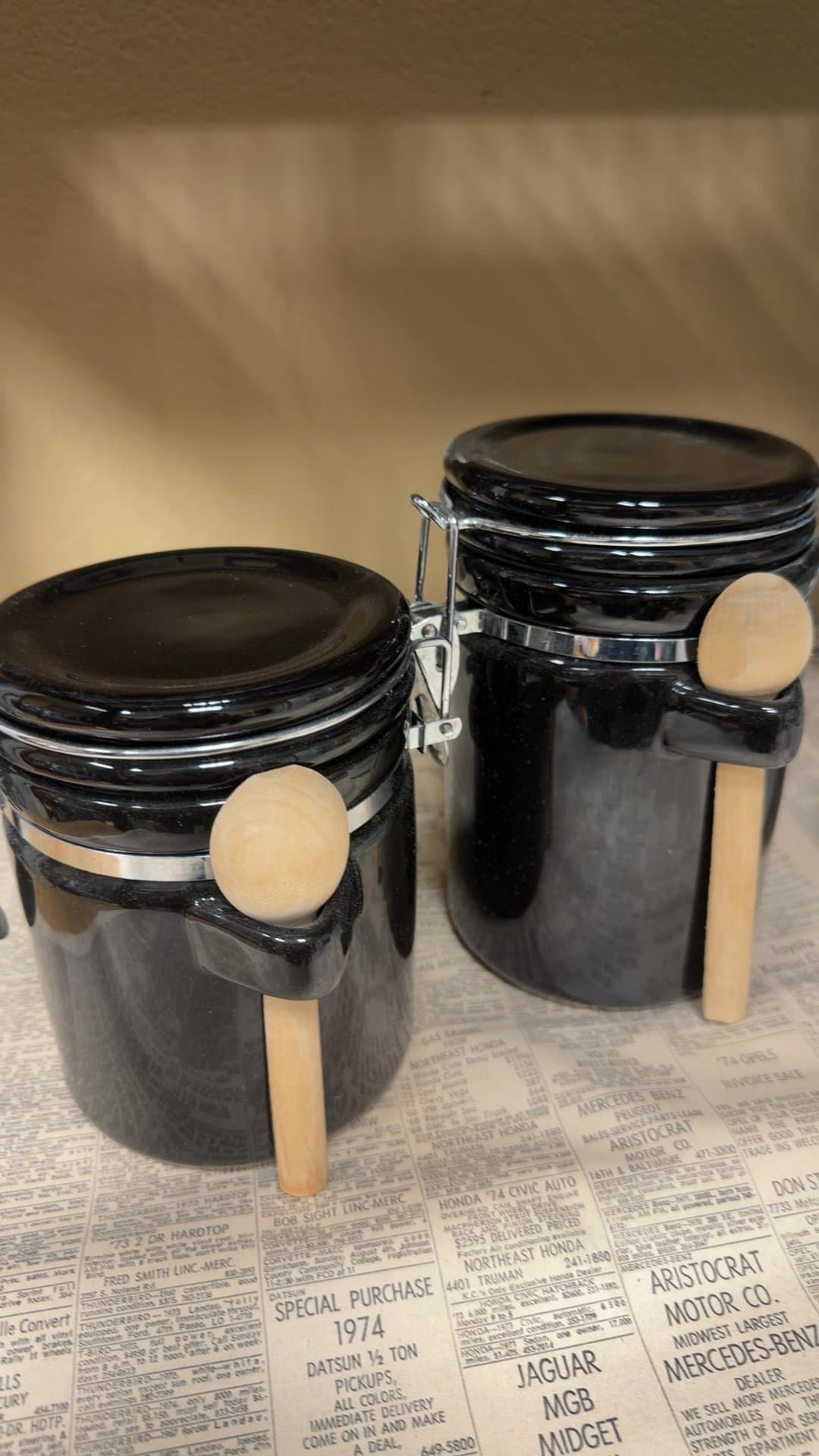 Black Ceramic Storage Jars with Wooden Spoons - Image 1