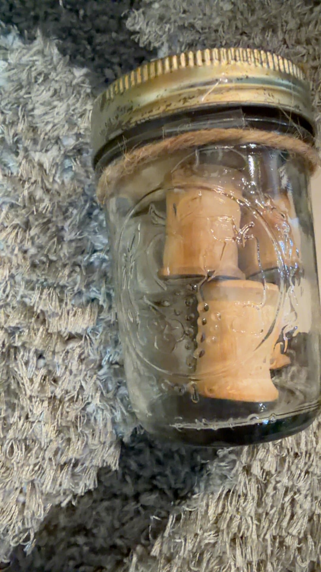 Vintage Glass Jar with Wooden Spools - Image 1