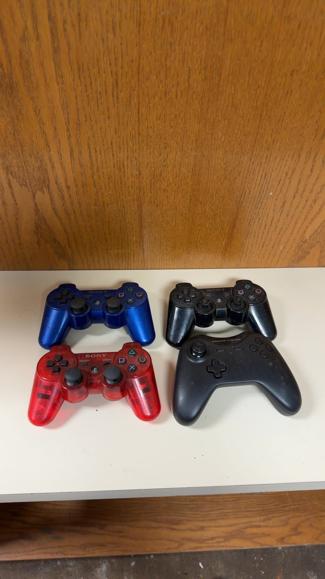 Sony PlayStation and Dream Vision Game Controllers - Image 1