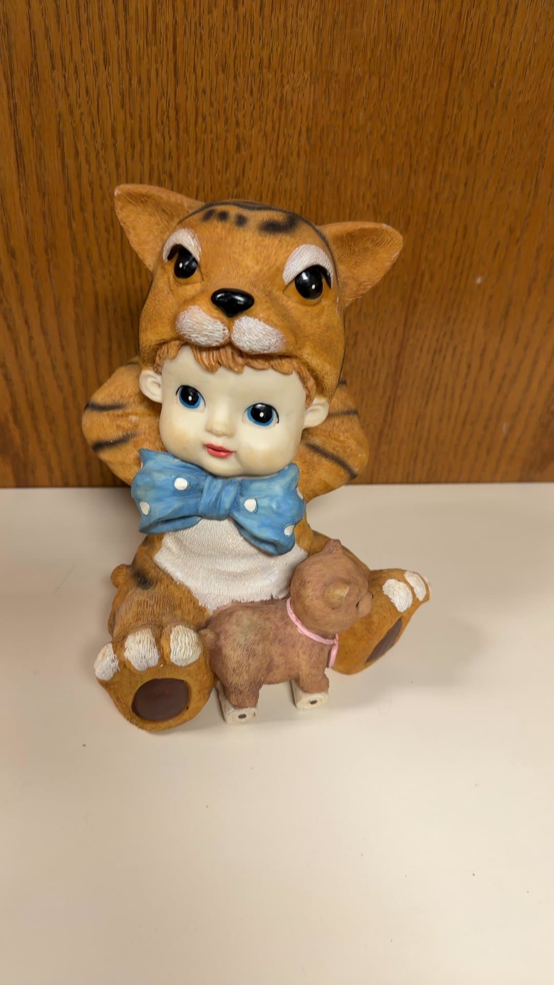 Child Figurine in Tiger Costume with Bear - Image 1