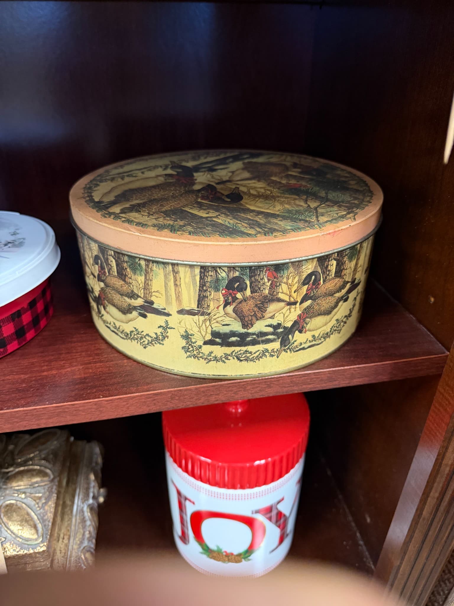 Decorative Round Tin with Bird and Forest Scene - Image 1